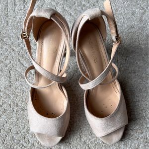 Nude Dreampairs strappy high heels.